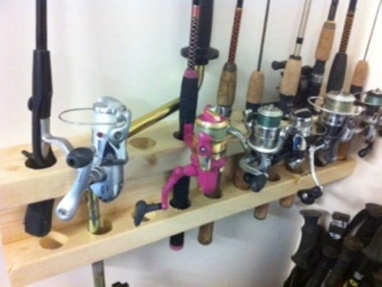 ... organize your rods, auger and fishing poles with this home made DIY fishing rod rack!