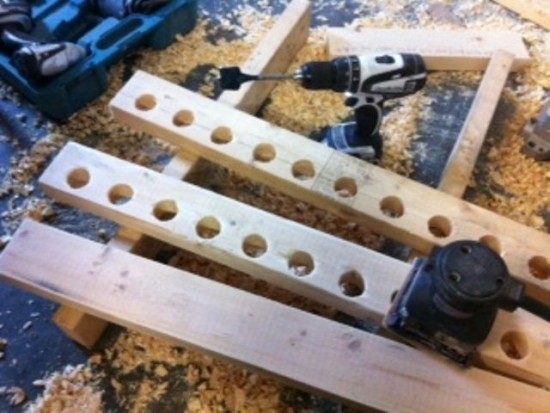 ... drilling & sanding the rod rack!